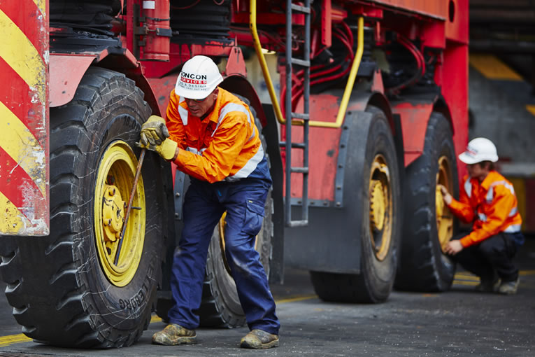 Matthew Darby changing a tyre Boncon Services